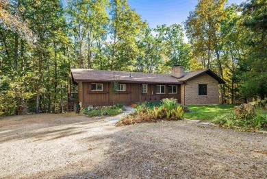 Stunning Contemporary log home, private lot backing up to wooded on Woodstone Meadows Golf Course At Massanutten in Virginia - for sale on GolfHomes.com, golf home, golf lot