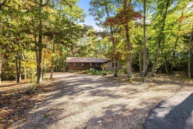 Stunning Contemporary log home, private lot backing up to wooded on Woodstone Meadows Golf Course At Massanutten in Virginia - for sale on GolfHomes.com, golf home, golf lot