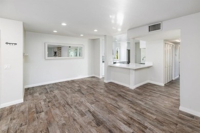 Welcome to this beautifully updated ground-level, end-unit condo on La Costa Resort and Spa in California - for sale on GolfHomes.com, golf home, golf lot