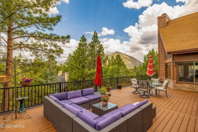 Cabin style home with views of Mt. Elden. You feel like you are on Continental Country Club in Arizona - for sale on GolfHomes.com, golf home, golf lot