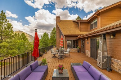 Cabin style home with views of Mt. Elden. You feel like you are on Continental Country Club in Arizona - for sale on GolfHomes.com, golf home, golf lot
