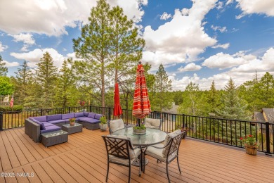 Cabin style home with views of Mt. Elden. You feel like you are on Continental Country Club in Arizona - for sale on GolfHomes.com, golf home, golf lot