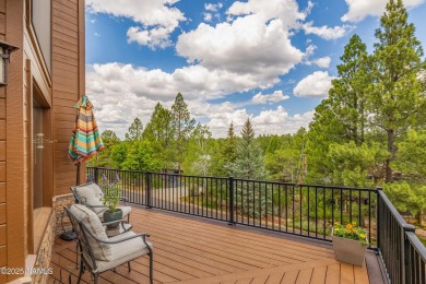 Cabin style home with views of Mt. Elden. You feel like you are on Continental Country Club in Arizona - for sale on GolfHomes.com, golf home, golf lot