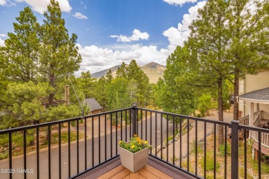 Cabin style home with views of Mt. Elden. You feel like you are on Continental Country Club in Arizona - for sale on GolfHomes.com, golf home, golf lot