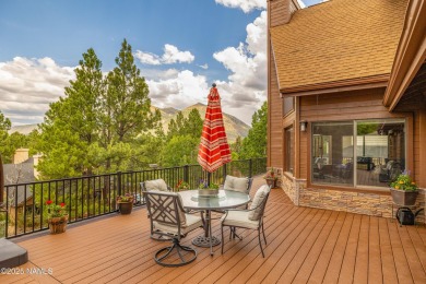 Cabin style home with views of Mt. Elden. You feel like you are on Continental Country Club in Arizona - for sale on GolfHomes.com, golf home, golf lot