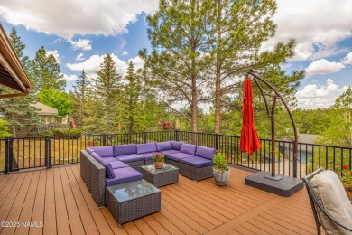 Cabin style home with views of Mt. Elden. You feel like you are on Continental Country Club in Arizona - for sale on GolfHomes.com, golf home, golf lot