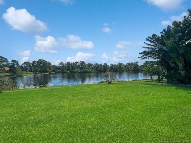 PRIVATE LAKESIDE RETREAT - This updated 5 BR, 6 bath, 4 garage on The Cape Club of Palm City in Florida - for sale on GolfHomes.com, golf home, golf lot