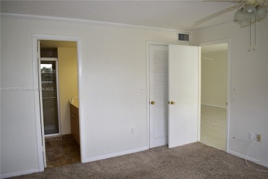 COMPLETE HURRICANE PROTECTION, a KITCHEN WALL HAS BEEN OPENED UP on Sunrise Lakes Phase III in Florida - for sale on GolfHomes.com, golf home, golf lot