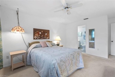 This METICULOUSLY MAINTAINED two bedroom, two bath condominium on San Carlos Golf Club in Florida - for sale on GolfHomes.com, golf home, golf lot