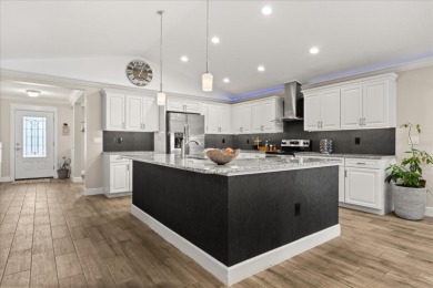 Welcome to this thoughtfully designed home on Deer Island, where on Deer Island Country Club in Florida - for sale on GolfHomes.com, golf home, golf lot