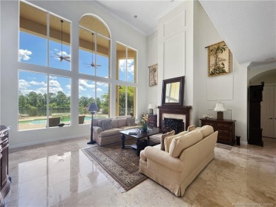 PRIVATE LAKESIDE RETREAT - This updated 5 BR, 6 bath, 4 garage on The Cape Club of Palm City in Florida - for sale on GolfHomes.com, golf home, golf lot