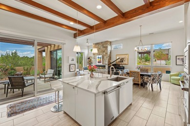 Discover the perfect blend of modern luxury and Southwest charm on The Club At Las Campanas  in New Mexico - for sale on GolfHomes.com, golf home, golf lot