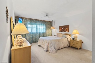 This METICULOUSLY MAINTAINED two bedroom, two bath condominium on San Carlos Golf Club in Florida - for sale on GolfHomes.com, golf home, golf lot