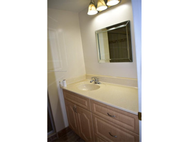COMPLETE HURRICANE PROTECTION, a KITCHEN WALL HAS BEEN OPENED UP on Sunrise Lakes Phase III in Florida - for sale on GolfHomes.com, golf home, golf lot