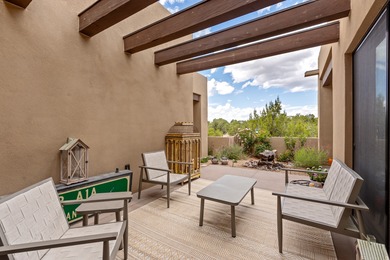 Discover the perfect blend of modern luxury and Southwest charm on The Club At Las Campanas  in New Mexico - for sale on GolfHomes.com, golf home, golf lot