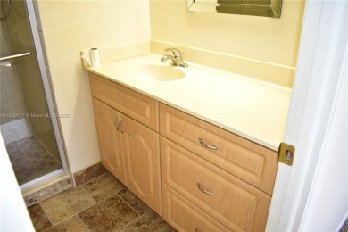 COMPLETE HURRICANE PROTECTION, a KITCHEN WALL HAS BEEN OPENED UP on Sunrise Lakes Phase III in Florida - for sale on GolfHomes.com, golf home, golf lot