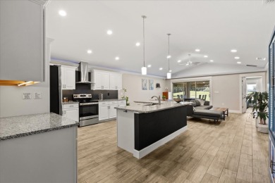 Welcome to this thoughtfully designed home on Deer Island, where on Deer Island Country Club in Florida - for sale on GolfHomes.com, golf home, golf lot
