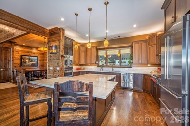 Set along the pristine shoreline of Ticoa Lake in the highly on Connestee Falls Golf Club in North Carolina - for sale on GolfHomes.com, golf home, golf lot