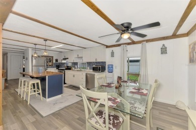 Located in the 55 +deed restricted Community of Holiday Park on Sabal Trace Golf and Country Club in Florida - for sale on GolfHomes.com, golf home, golf lot