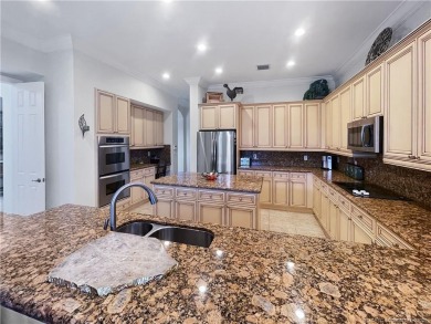 PRIVATE LAKESIDE RETREAT - This updated 5 BR, 6 bath, 4 garage on The Cape Club of Palm City in Florida - for sale on GolfHomes.com, golf home, golf lot