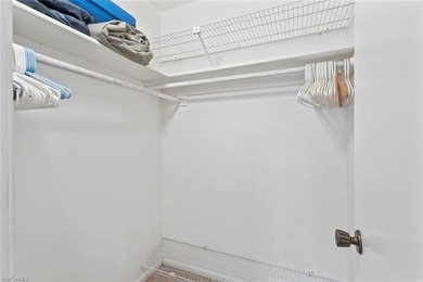 This METICULOUSLY MAINTAINED two bedroom, two bath condominium on San Carlos Golf Club in Florida - for sale on GolfHomes.com, golf home, golf lot