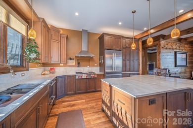 Set along the pristine shoreline of Ticoa Lake in the highly on Connestee Falls Golf Club in North Carolina - for sale on GolfHomes.com, golf home, golf lot