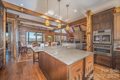 Set along the pristine shoreline of Ticoa Lake in the highly on Connestee Falls Golf Club in North Carolina - for sale on GolfHomes.com, golf home, golf lot