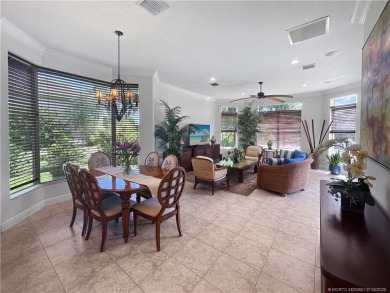 PRIVATE LAKESIDE RETREAT - This updated 5 BR, 6 bath, 4 garage on The Cape Club of Palm City in Florida - for sale on GolfHomes.com, golf home, golf lot