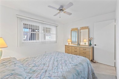 This METICULOUSLY MAINTAINED two bedroom, two bath condominium on San Carlos Golf Club in Florida - for sale on GolfHomes.com, golf home, golf lot