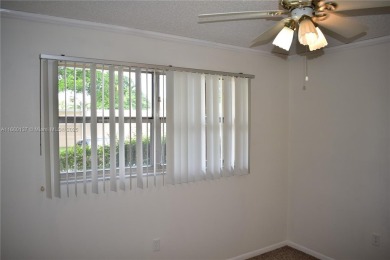 COMPLETE HURRICANE PROTECTION, a KITCHEN WALL HAS BEEN OPENED UP on Sunrise Lakes Phase III in Florida - for sale on GolfHomes.com, golf home, golf lot