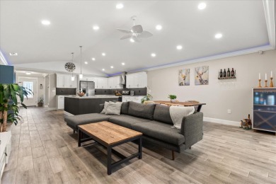 Welcome to this thoughtfully designed home on Deer Island, where on Deer Island Country Club in Florida - for sale on GolfHomes.com, golf home, golf lot