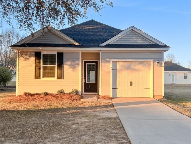 Welcome to this charming ranch style home in Clubway Commons on Players Course At Wyboo Plantation in South Carolina - for sale on GolfHomes.com, golf home, golf lot