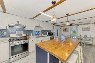 Located in the 55 +deed restricted Community of Holiday Park on Sabal Trace Golf and Country Club in Florida - for sale on GolfHomes.com, golf home, golf lot