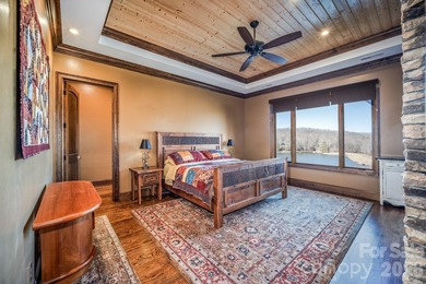 Set along the pristine shoreline of Ticoa Lake in the highly on Connestee Falls Golf Club in North Carolina - for sale on GolfHomes.com, golf home, golf lot