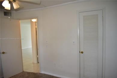 COMPLETE HURRICANE PROTECTION, a KITCHEN WALL HAS BEEN OPENED UP on Sunrise Lakes Phase III in Florida - for sale on GolfHomes.com, golf home, golf lot