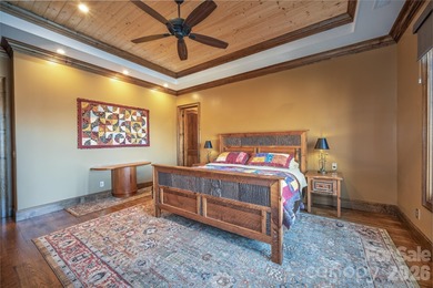 Set along the pristine shoreline of Ticoa Lake in the highly on Connestee Falls Golf Club in North Carolina - for sale on GolfHomes.com, golf home, golf lot