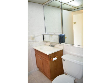 COMPLETE HURRICANE PROTECTION, a KITCHEN WALL HAS BEEN OPENED UP on Sunrise Lakes Phase III in Florida - for sale on GolfHomes.com, golf home, golf lot
