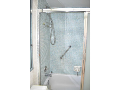 COMPLETE HURRICANE PROTECTION, a KITCHEN WALL HAS BEEN OPENED UP on Sunrise Lakes Phase III in Florida - for sale on GolfHomes.com, golf home, golf lot