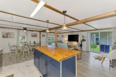 Located in the 55 +deed restricted Community of Holiday Park on Sabal Trace Golf and Country Club in Florida - for sale on GolfHomes.com, golf home, golf lot
