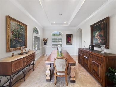 PRIVATE LAKESIDE RETREAT - This updated 5 BR, 6 bath, 4 garage on The Cape Club of Palm City in Florida - for sale on GolfHomes.com, golf home, golf lot