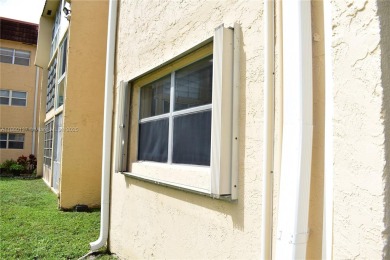 COMPLETE HURRICANE PROTECTION, a KITCHEN WALL HAS BEEN OPENED UP on Sunrise Lakes Phase III in Florida - for sale on GolfHomes.com, golf home, golf lot