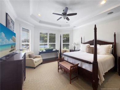 PRIVATE LAKESIDE RETREAT - This updated 5 BR, 6 bath, 4 garage on The Cape Club of Palm City in Florida - for sale on GolfHomes.com, golf home, golf lot