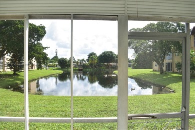 COMPLETE HURRICANE PROTECTION, a KITCHEN WALL HAS BEEN OPENED UP on Sunrise Lakes Phase III in Florida - for sale on GolfHomes.com, golf home, golf lot