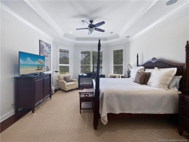PRIVATE LAKESIDE RETREAT - This updated 5 BR, 6 bath, 4 garage on The Cape Club of Palm City in Florida - for sale on GolfHomes.com, golf home, golf lot