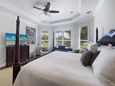PRIVATE LAKESIDE RETREAT - This updated 5 BR, 6 bath, 4 garage on The Cape Club of Palm City in Florida - for sale on GolfHomes.com, golf home, golf lot