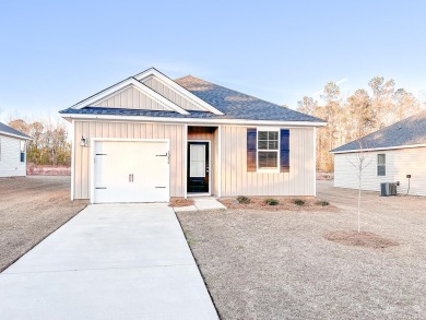 Welcome to this charming ranch style home in Clubway Commons on Players Course At Wyboo Plantation in South Carolina - for sale on GolfHomes.com, golf home, golf lot