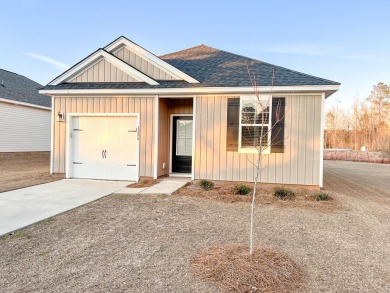 Welcome to this charming ranch style home in Clubway Commons on Players Course At Wyboo Plantation in South Carolina - for sale on GolfHomes.com, golf home, golf lot