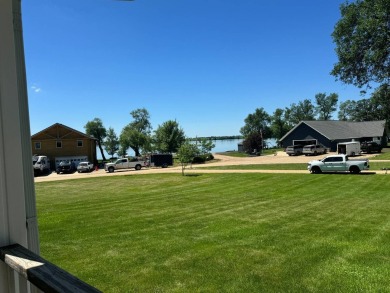 Roy Lake back lot home located on Roykota Dr. Lake City, SD with on Roy View Golf Course in South Dakota - for sale on GolfHomes.com, golf home, golf lot