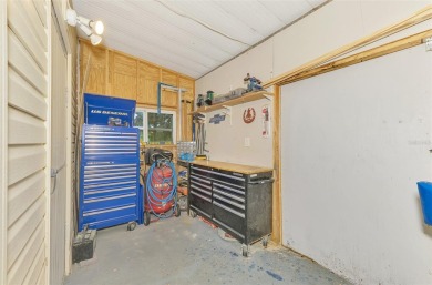 Located in the 55 +deed restricted Community of Holiday Park on Sabal Trace Golf and Country Club in Florida - for sale on GolfHomes.com, golf home, golf lot