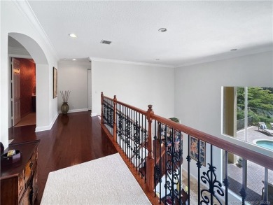 PRIVATE LAKESIDE RETREAT - This updated 5 BR, 6 bath, 4 garage on The Cape Club of Palm City in Florida - for sale on GolfHomes.com, golf home, golf lot